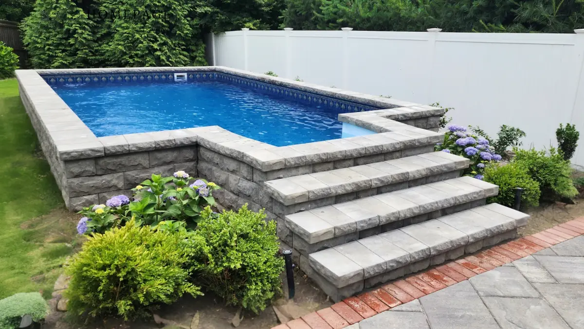 Semi-inground pool with stone steps